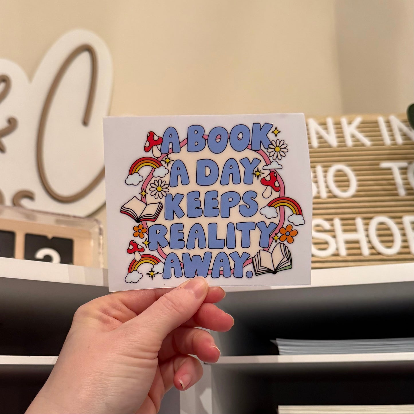 A Book A Day Keeps Reality Away UVDTF 4” Decal