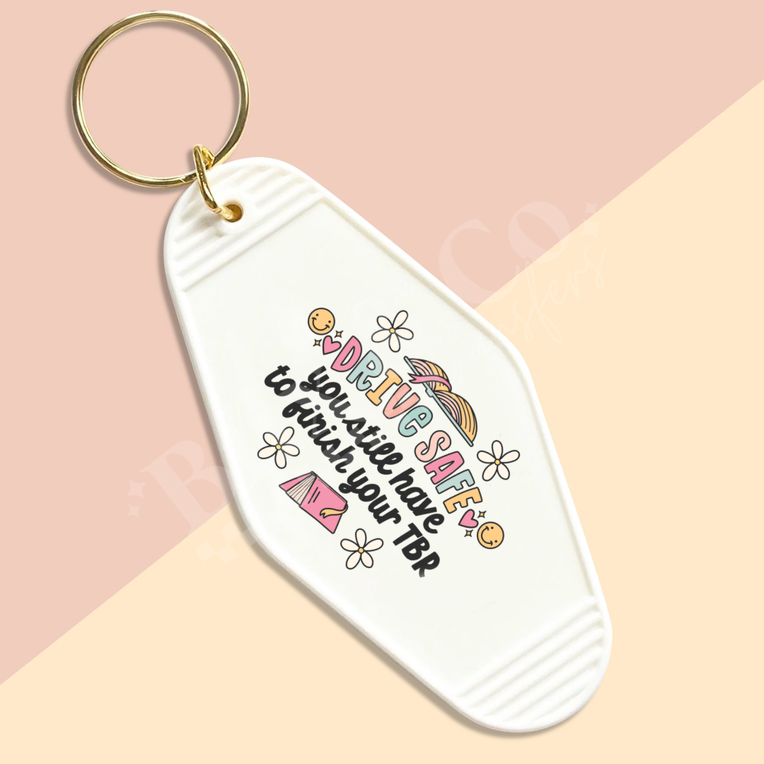 Drive Safe You Still Need To Finish Your TBR Motel Keychain UVDTF Transfer (Copy)